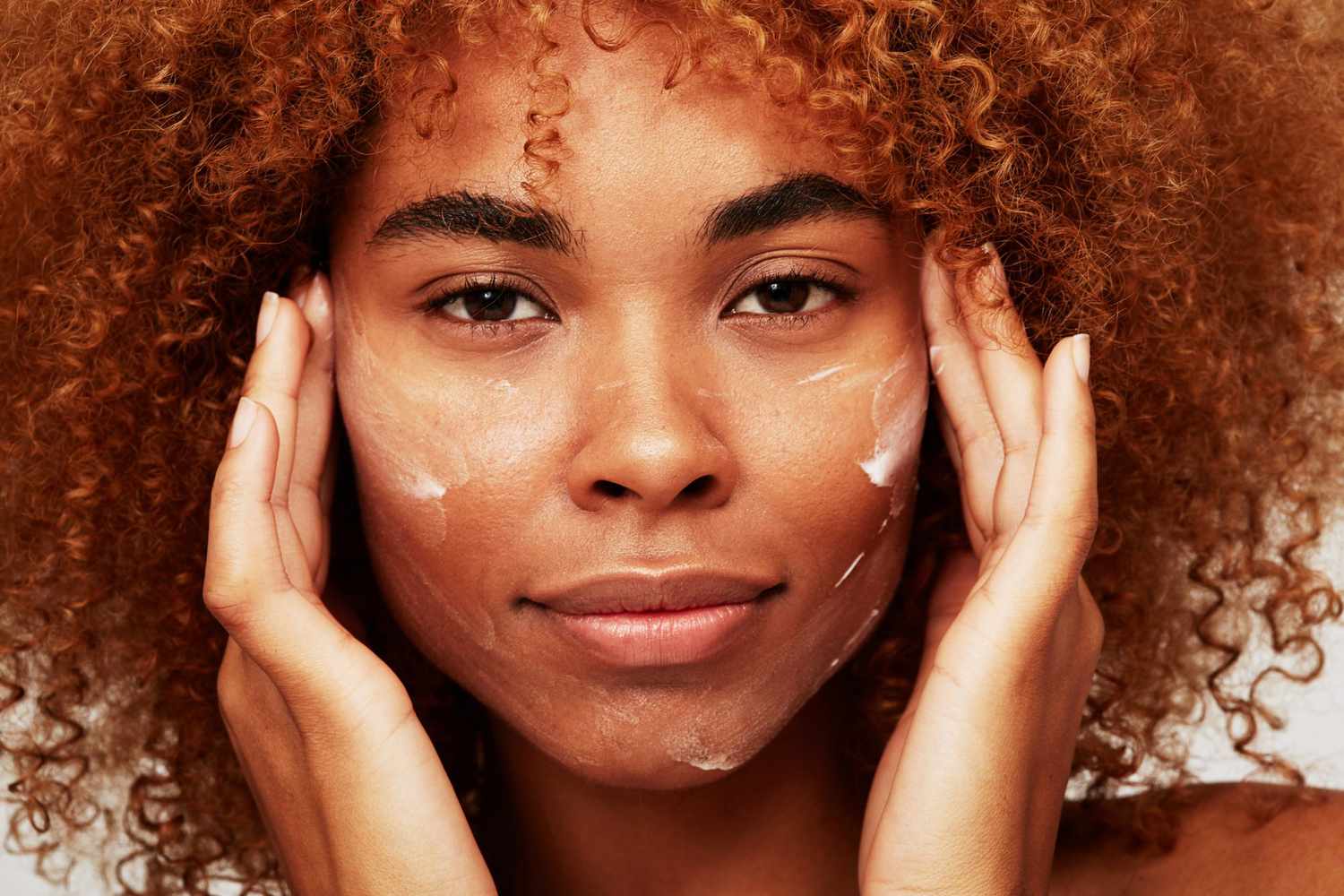 photo of a woman with dry melanated skin